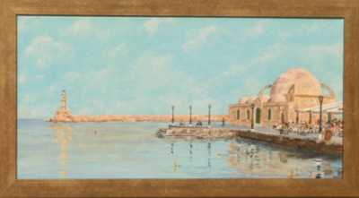 Chania harbour in winter. The Mosque shines in the sun